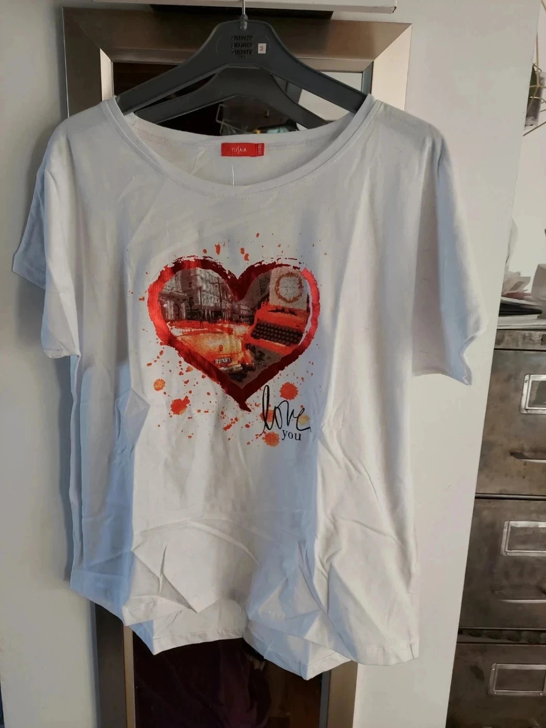 Camiseta larga 38/40 nova – photo 3